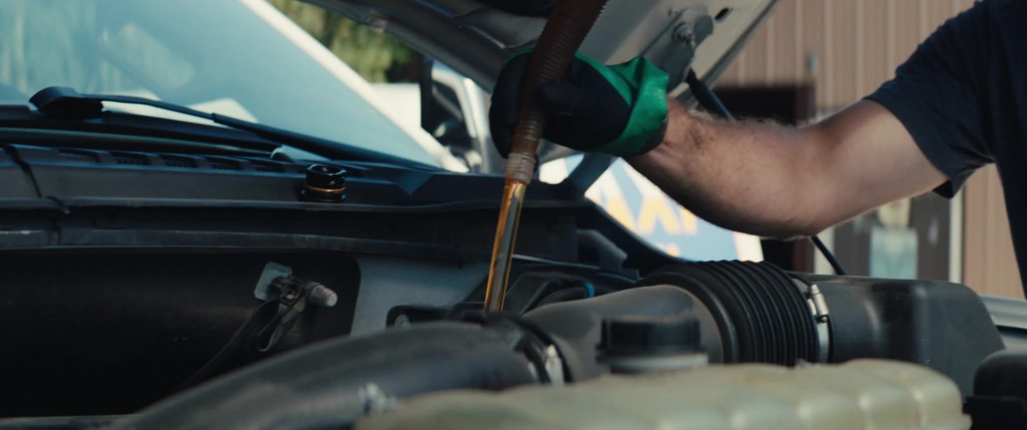 Fresh full-synthetic oil poured during a MAXI mobile service